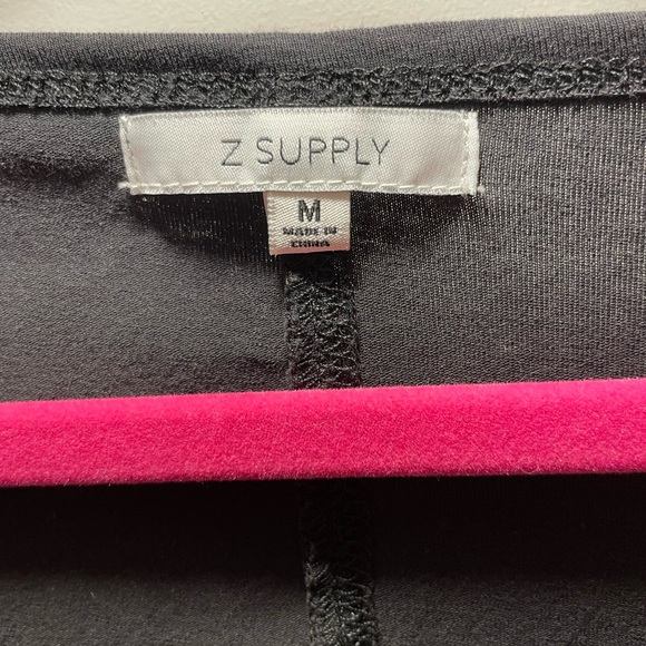 Black t-shirt style dress. - Picture 2 of 4